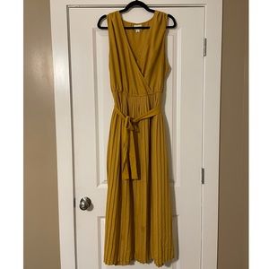 Long, pleated dress.